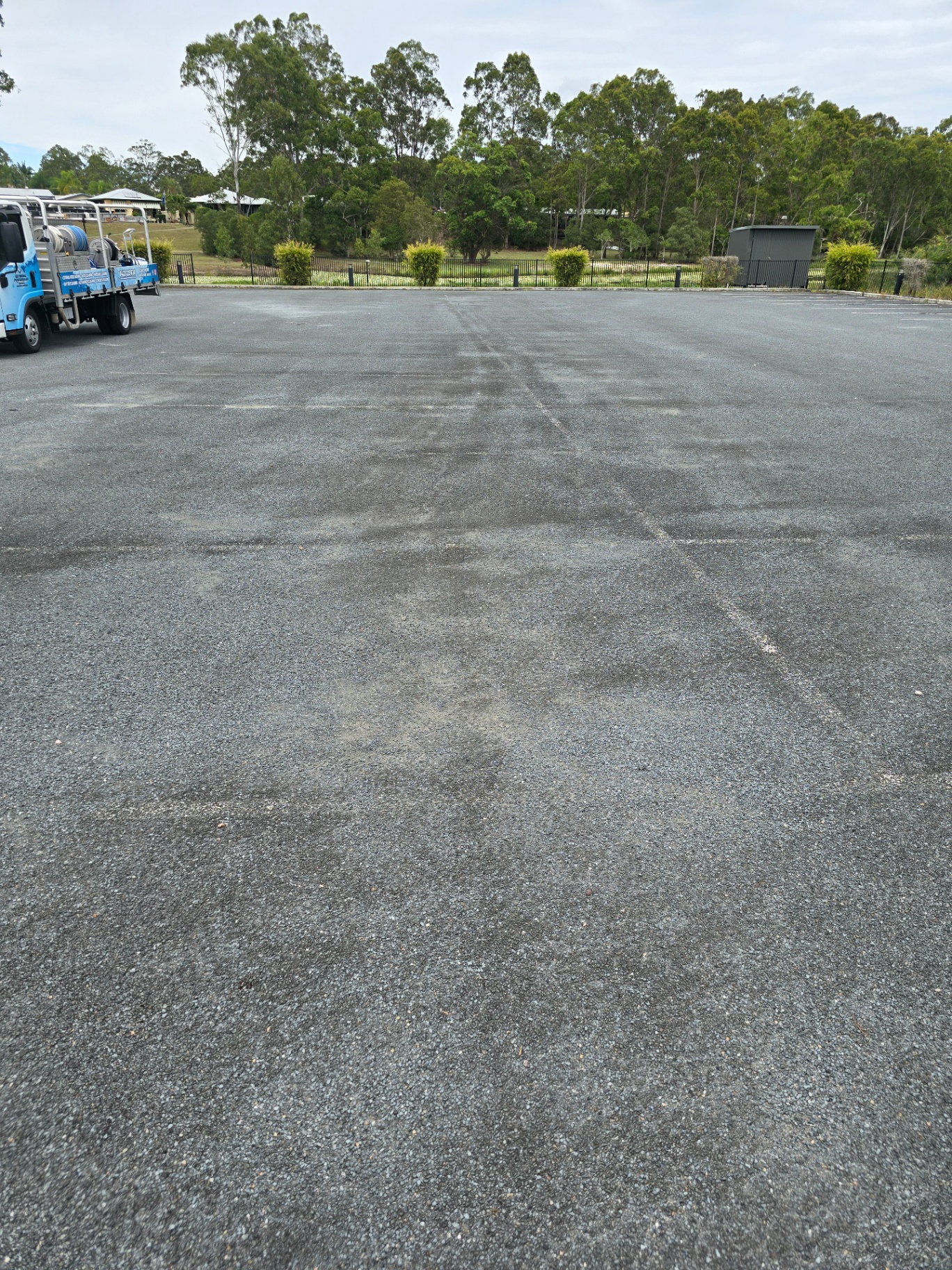 Faded car park lines before remarking