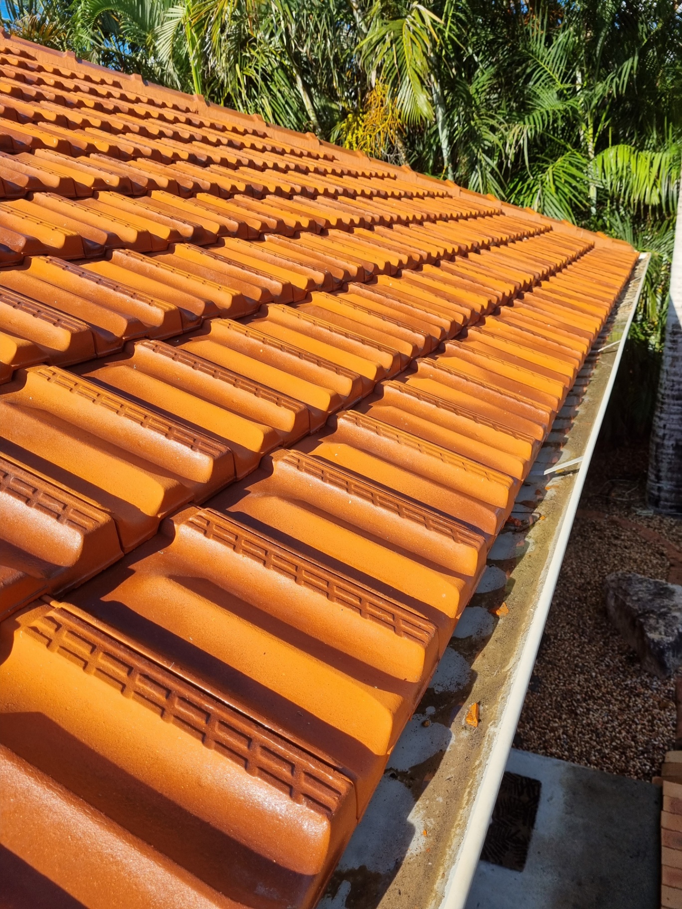 Restored vibrant roof tiles after soft wash
