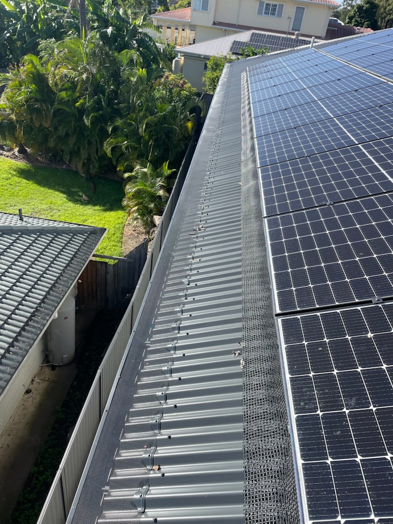 Professional solar panel birdproofing installation on colorbond roof — South East Queensland